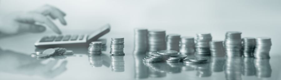 images of a calculator and stacks of coins