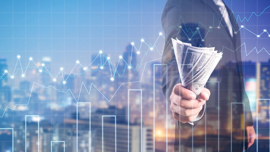 business money graph and man holding cash